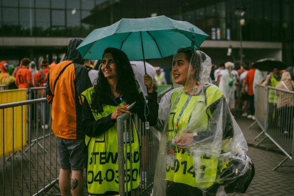 steward with umbrella